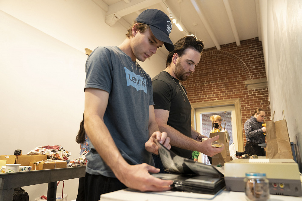 James Wicker'21 and Jacob Sligar'21 begin arranging their objects for the Beloit Collects! exhibit.