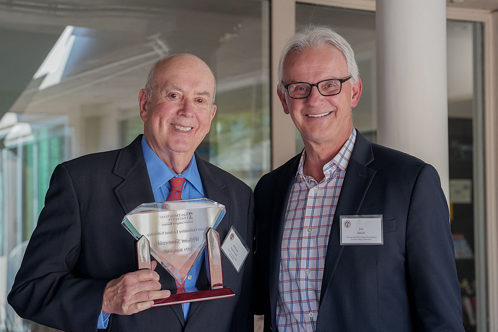 William Sannwald'63, left, was awarded a Glazer Fellowship for outstanding teaching in the Fowler College of Business at San Diego State ...