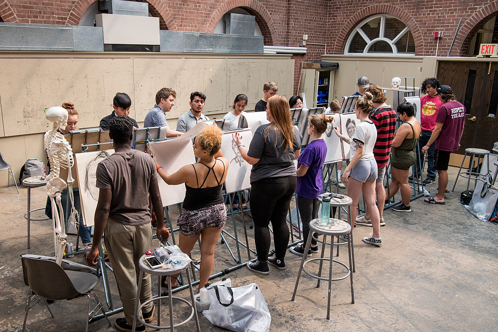 Students in Professor Scott Espeseth's Introduction to Drawing and Design class at work on a still life in 2018.