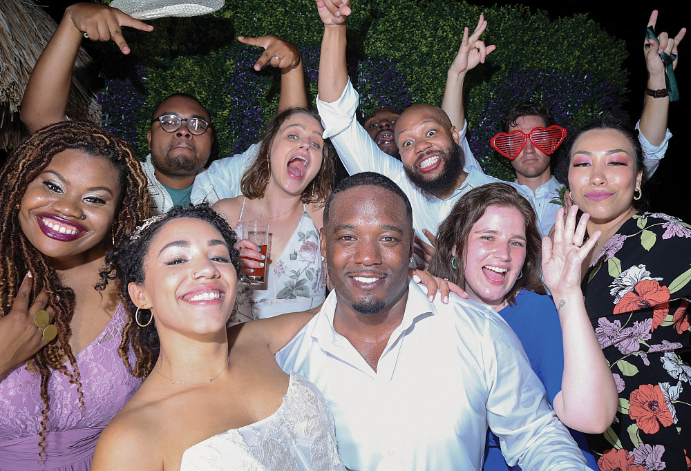 Reine Lucas'15 and Ray Thomas'13 Reine Lucas'15 and Ray Thomas'13 were married in Cancun, Mexico, this past April. Shown from left, first row: Ashaki Nzhinga Ha...
