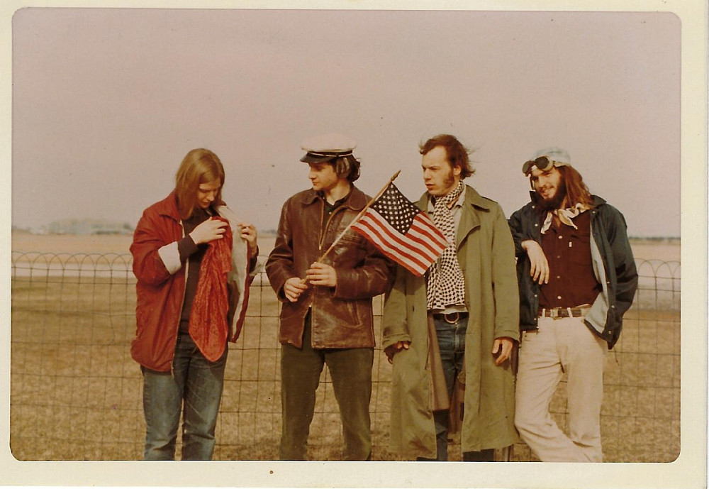 From left are Liz Ehrich'74, Len Pagliaro'76, Peter Valentine'76, and Will Stevens'77 in 1974 at the Rock County Airp...