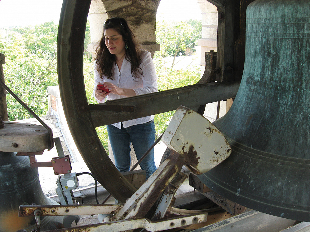 Amara Pugens'13 in the Eaton Chapel bell tower, researching campus history in 2013.