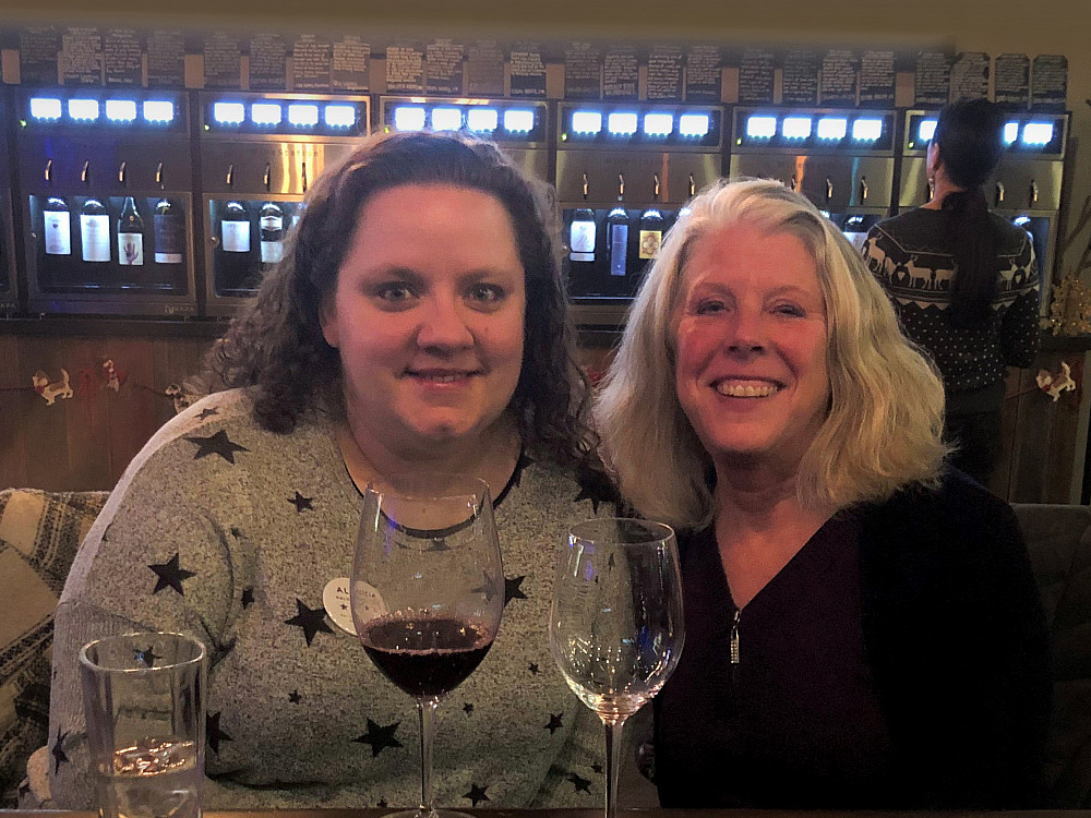 Enjoying good wine spans all generations. While Anne Wood Wandler'83, right, was meeting a new employee at Spring City Wine House in Wauk...