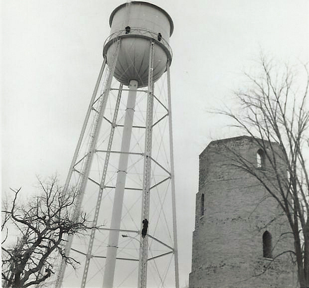 One of the most notorious Basic Elmo- era escapades was the water tower climb of 1973. Len Pagliaro'76, Chris Frelick'74, and Ed Friedman...