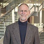Professor of Economics Warren Bruce Palmer started his Beloit teaching career in 1992. He has taught microeconomics, macroeconomics, acco...