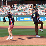 Cole Philpott and Aiden Phipps '25 throw the first pitch.