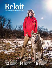 Susan Turner Vogt '83 with D'Artagnan, one of 26 wolfdogs she's rescued and provided a home for at the Red Riding Hood Sanctuary.