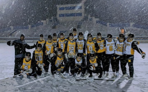 Tobin Greenwald'20 with the lacrosse team in the middle of a snow storm in early 2019.