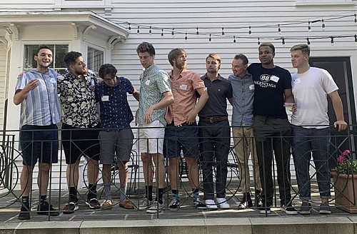 Cory Arnett'20 and friends standing together.