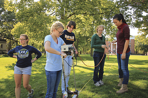 Students use modern technology to learn more about the mounds.