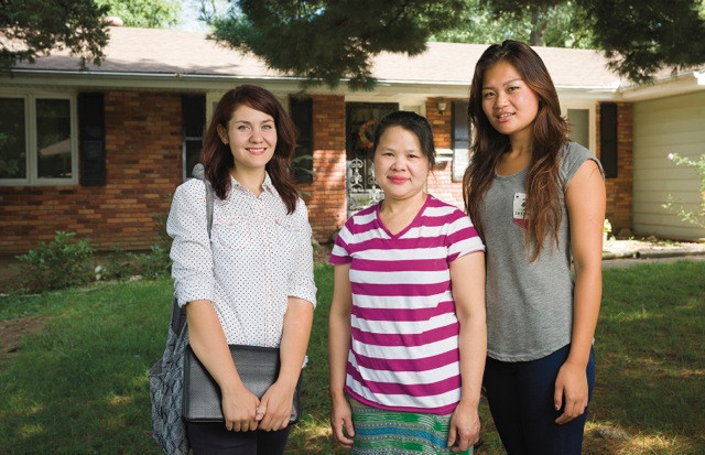Angela Martellaro'10, left, is a licensed realtor who works almost exclusively with refugees buying their first homes. She is shown ...