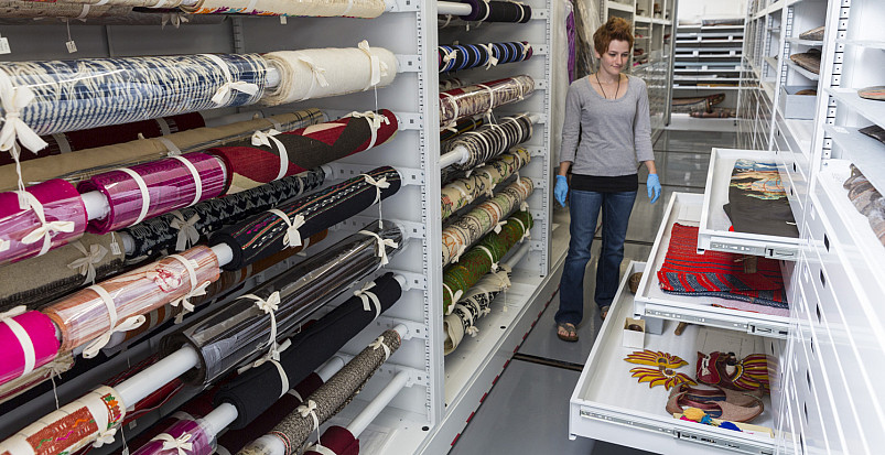 Assistant Curator Krista Barry'15 in the textile storage area of the Logan Museum of Anthropology...