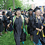 Senior class officer Miranda James’15 gives a joyous shout at the end of the Commencement ceremony.