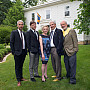 Alumni who received Distinguished Service Citations at Beloit’s 2016 Reunion join College President Scott Bierman in front of the President’s House on campus. From left are Matt Tolmach’86, Daniel Ames’91, Alisan Goldfarb’71, President Bierman, and Bob Norris’66.